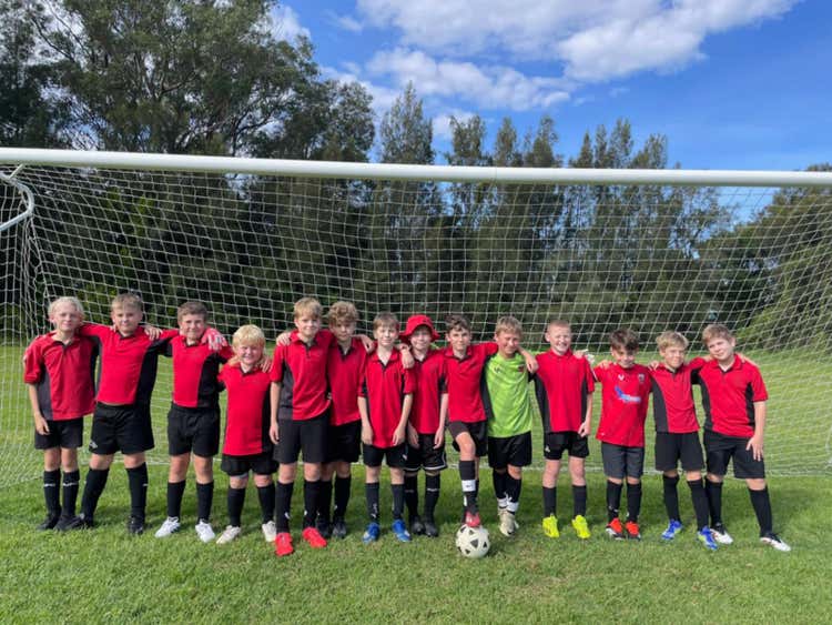 Soccer team posing for a photo