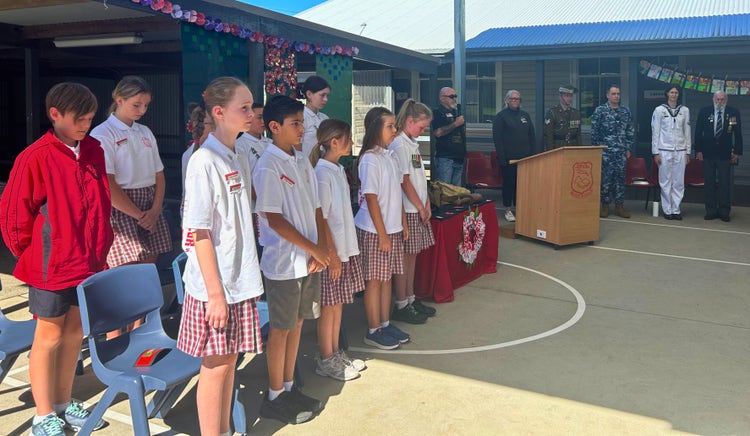 Students participating in a minute silence for ANZAC Day